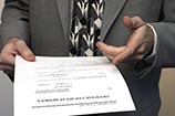 Image of process server serving summons